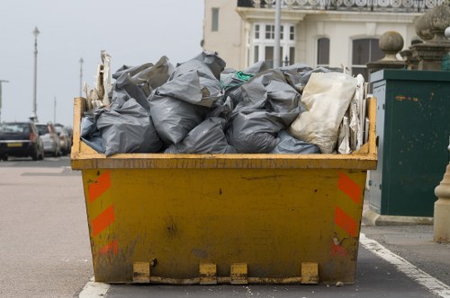 Waste removal truck at a construction site