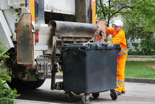 Construction workers sorting waste materials